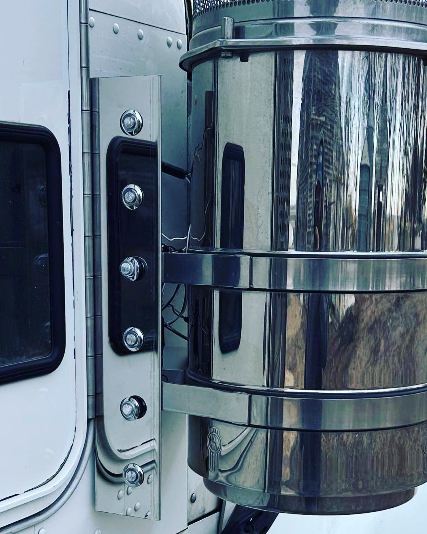 Kenworth stainless rear penny light breather panels